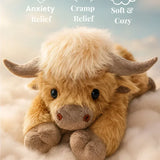 Golden Highland cow plush with curved horns and shaggy fur